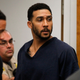 Kellen Winslow Jr., center, leaves his arraignment Friday.